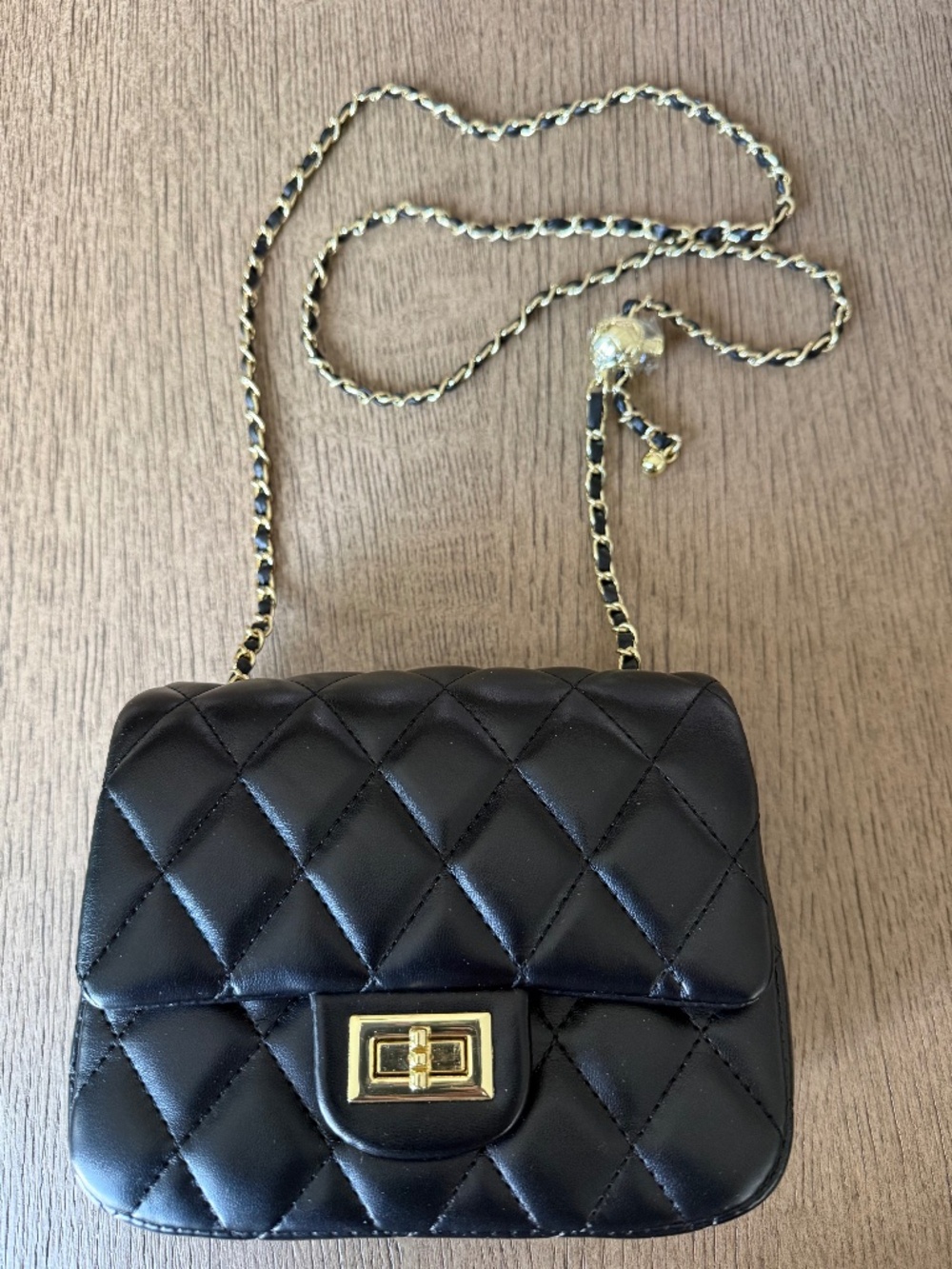 Small crossbody black quilted bag